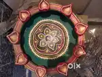 1Clay Urli with diyas(1500 ) Brass urli(1500)