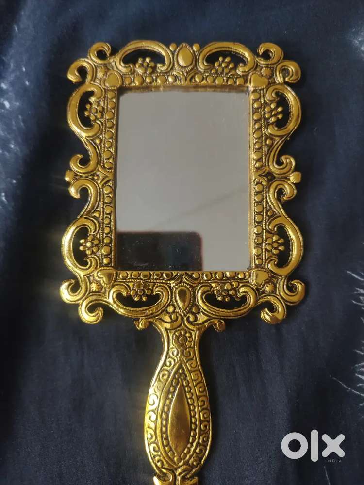 Golden coloured Antique old mirror