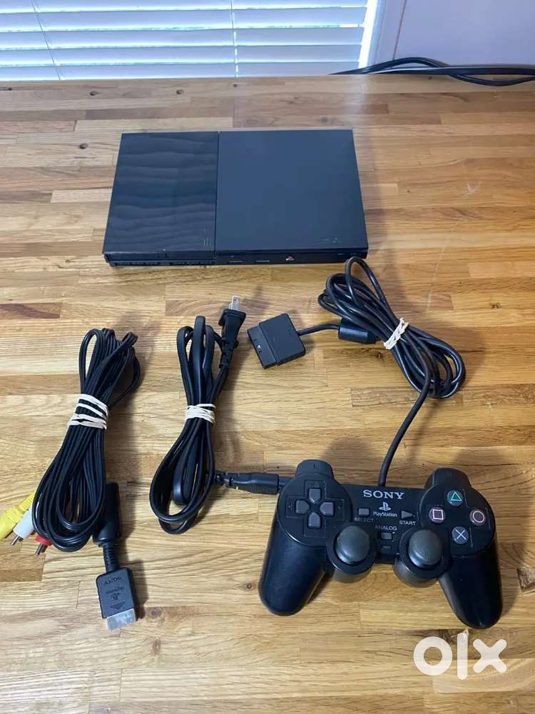 PS2 SLIM WITH 200 GAMES