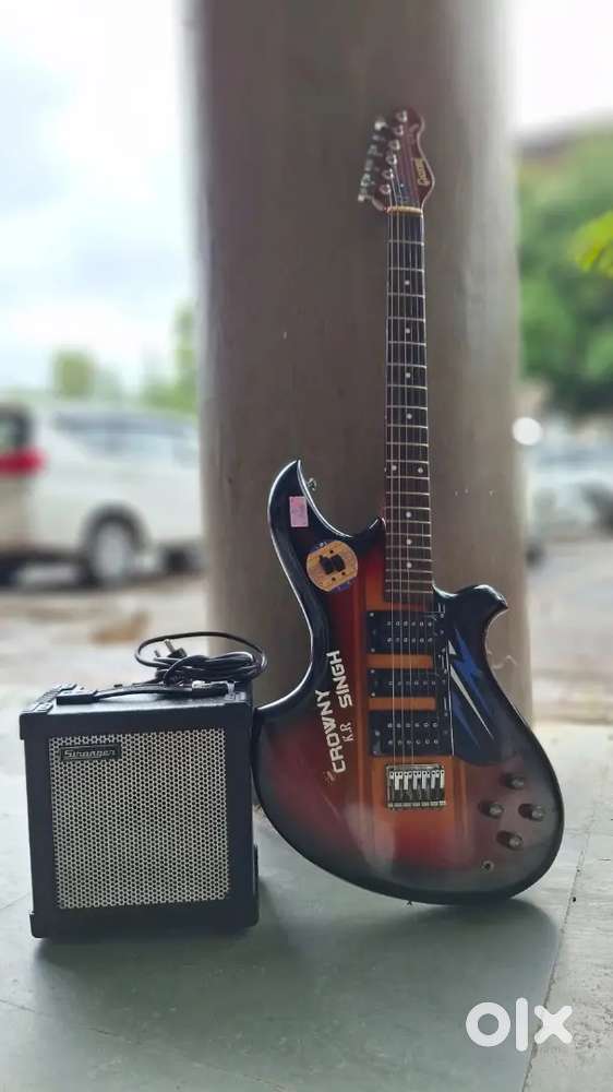 Givson electric guitar with stranger amplifier