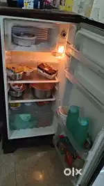 Fridge,sethi sofa,and table