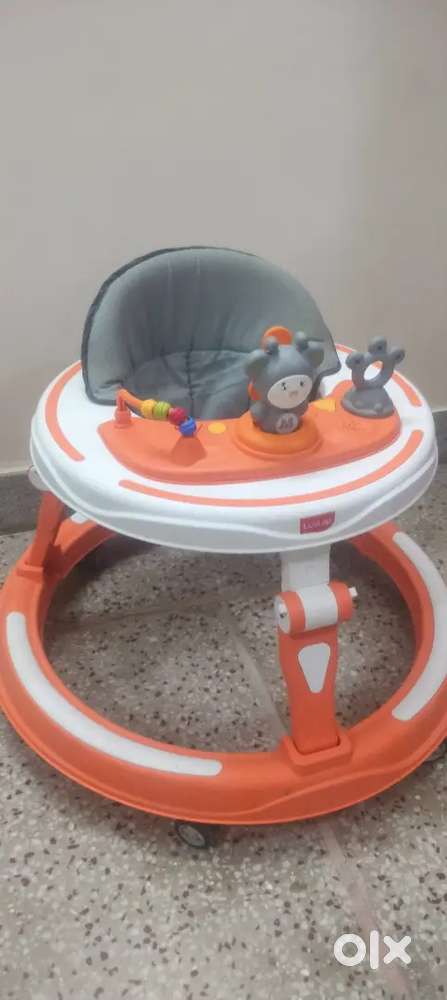 Baby Walker 4 months used and in perfect condition