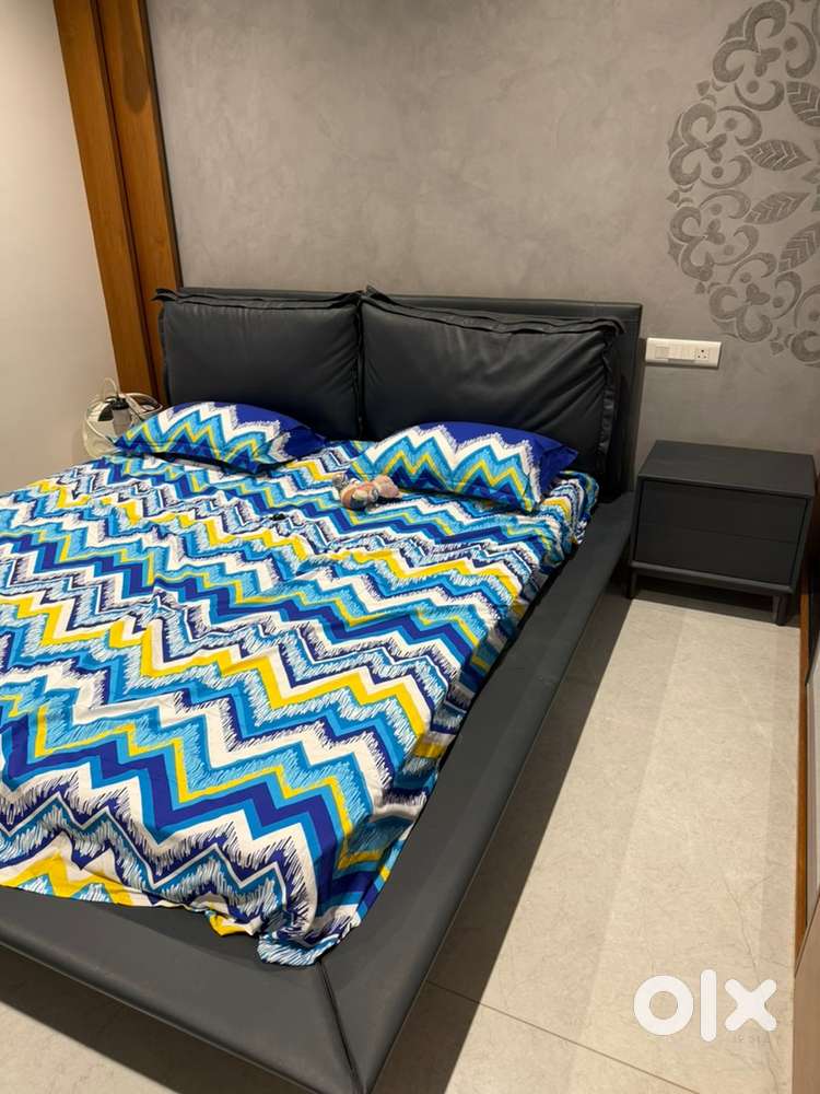 King size leather bed woth brand new mattress