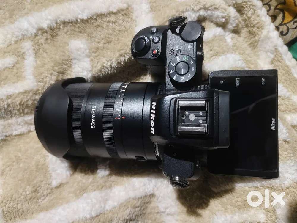 Nikon z50 camera Sutter count 18k .z mount 50 mm lens just 1 week