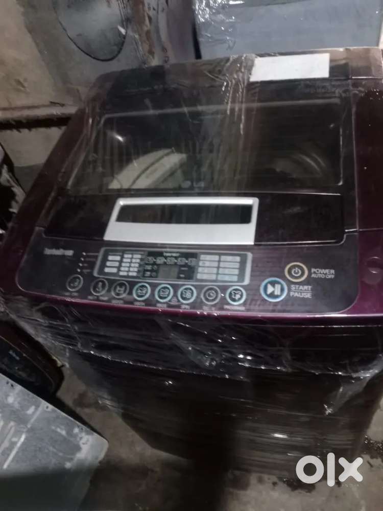 LG washing machine fully automatic top load with warranty 1 year old