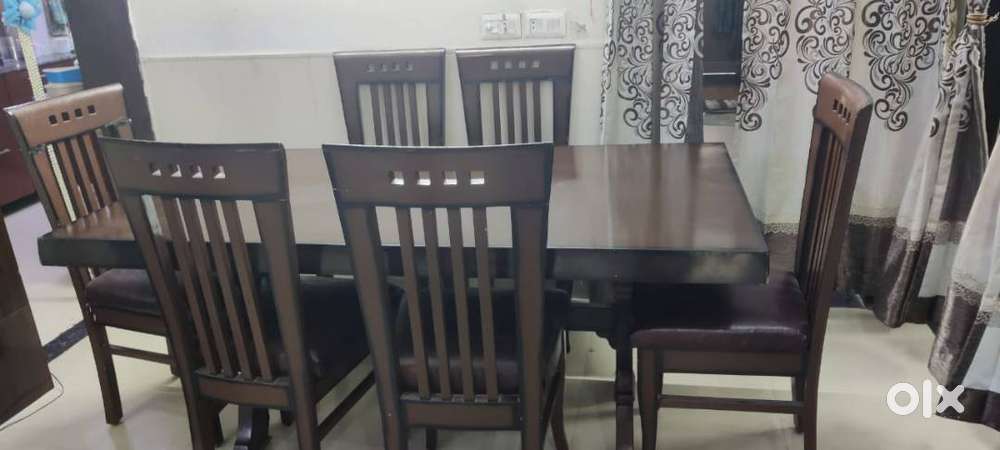 SIX SEATER WOODEN DINNING TABLE