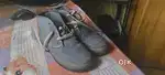 Blue WoodLand suede mid-top shoes with strong rubber soles.