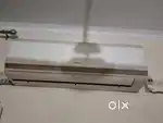 1.5 ton Hitachi make DC invertor AC in working condition