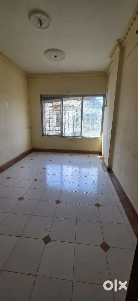 1BHK CONVERTED 1.5BHK WITH OC KRISHNA TOWER OPP BALAJI HOTEL EAST WEST