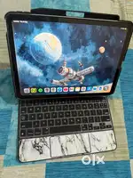 IPAD AIR 5 (256GB WIFI ONLY STARLIGHT) AND APPLE MAGIC KEYBOARD FOLIO