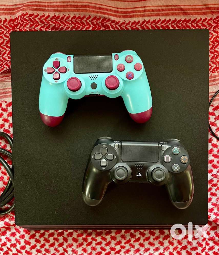 PS4 Pro Limited edition 1-TB + 2 controllers. Price negotiable