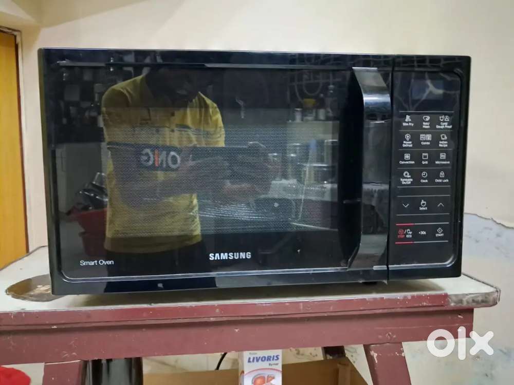 Samsung 28L, Convection Microwave Oven with child safety lock.