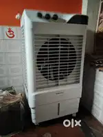 4 month Old Bajaj room cloor 65 liter under 3 year warranty