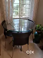 Glass top dining table plus chair