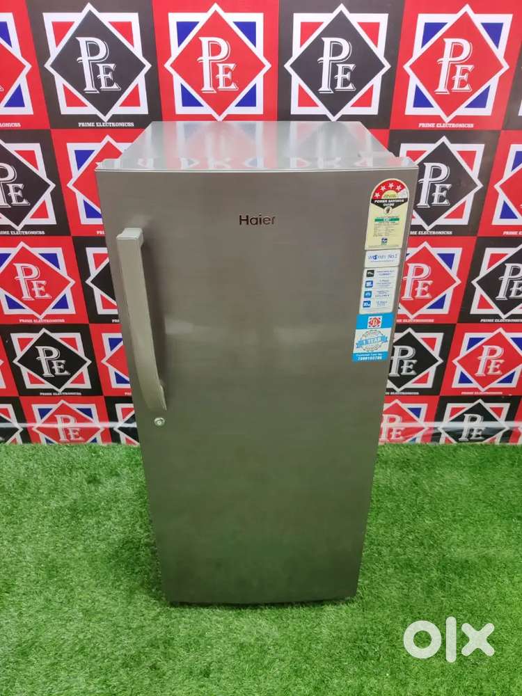 ;*- Big fridge of Haier still with inside stand and free warranty --$