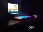 A GAMING LAPTOP, MOUSE , PAD AND RGB KEYBOARD WITH HIGH GRAPHICS CARD