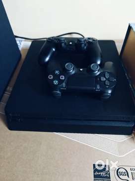 PS4 Slim (1 TB) with extra controller up for sale