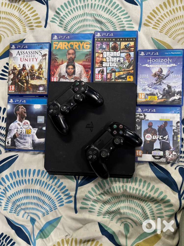 Playstation 4 , with 2 controllers and games