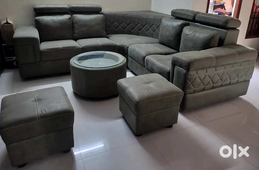 Corner sofa set with round table