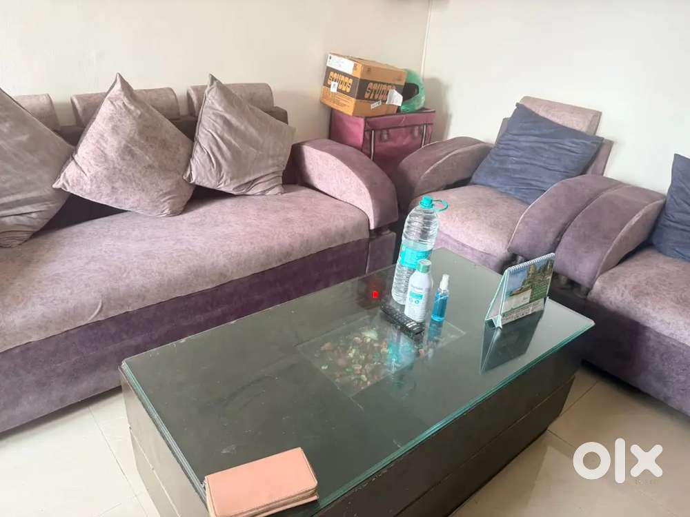 Selling 5 seater Sofa With center table.