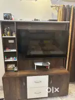 LED cabinet with wheels 1 year 6 months old and 55 inch Google LED TV