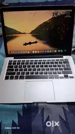 MacBook (Retina, 13-inch, Early) with charger