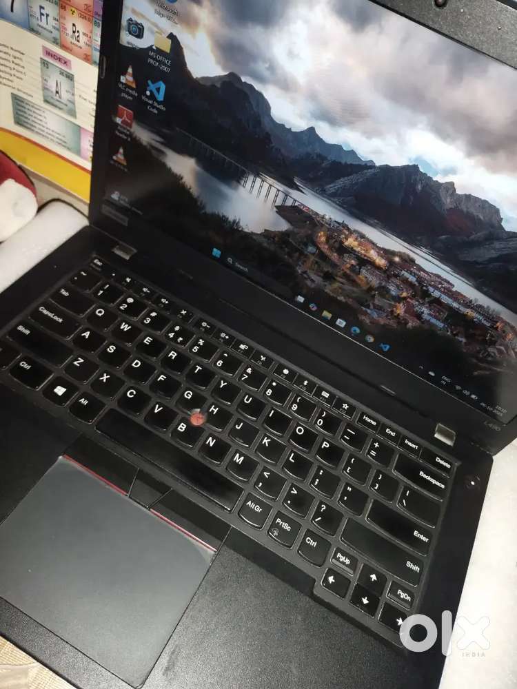 ThinkPad Laptop with uses in high performance like coding and gaming.