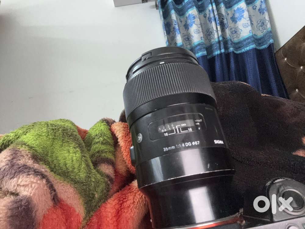 Sony 35mm sigma 1.4 lens good condition