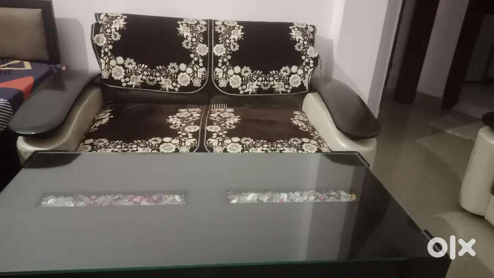 Seven seater sofa with center table