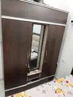 Wooden dark brown cupboard almirah
