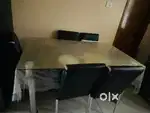 6-Seater Glass Dining Table  Free 6 Black Chairs