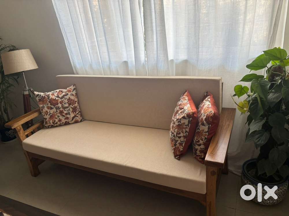 Brand new 2-month old, solid teakwood 3-seater beige sofa for sale.