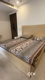 Wooden bed with full laminated large storage in excellent condition