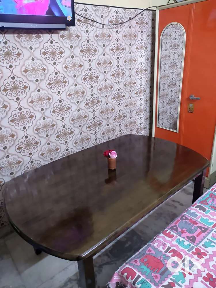 Wooden 6 seater dining table