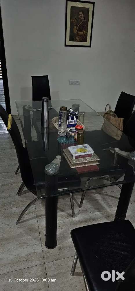 Dining table.with 6 Chairs glass top