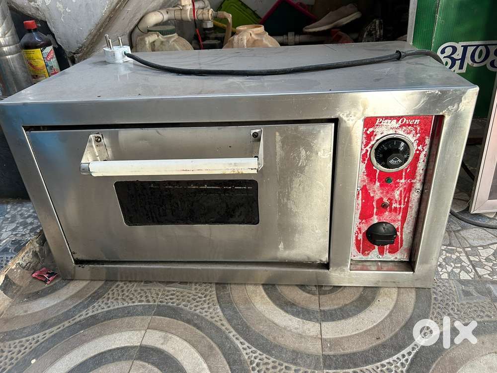 Very less used Pizza oven for sale.