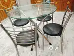 STEEL CHAIR WITH GOOD SPONGE QUALITY AND A GLASSTABLE WITH A STAND