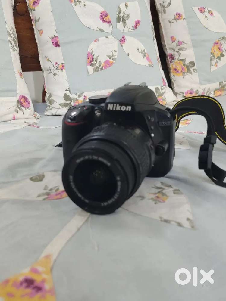 Nikon D3300 DSLR with lens and bag