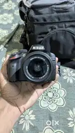 Nikon D3200 completely in new condition ( not used much)