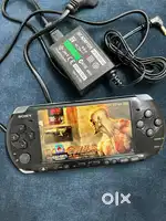 PSP 3000 with 10 Games, Charger and SD Card.