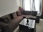 7 seater sofa with covers and centre table with Glass