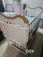 Baby cot with matress, net cover & storage