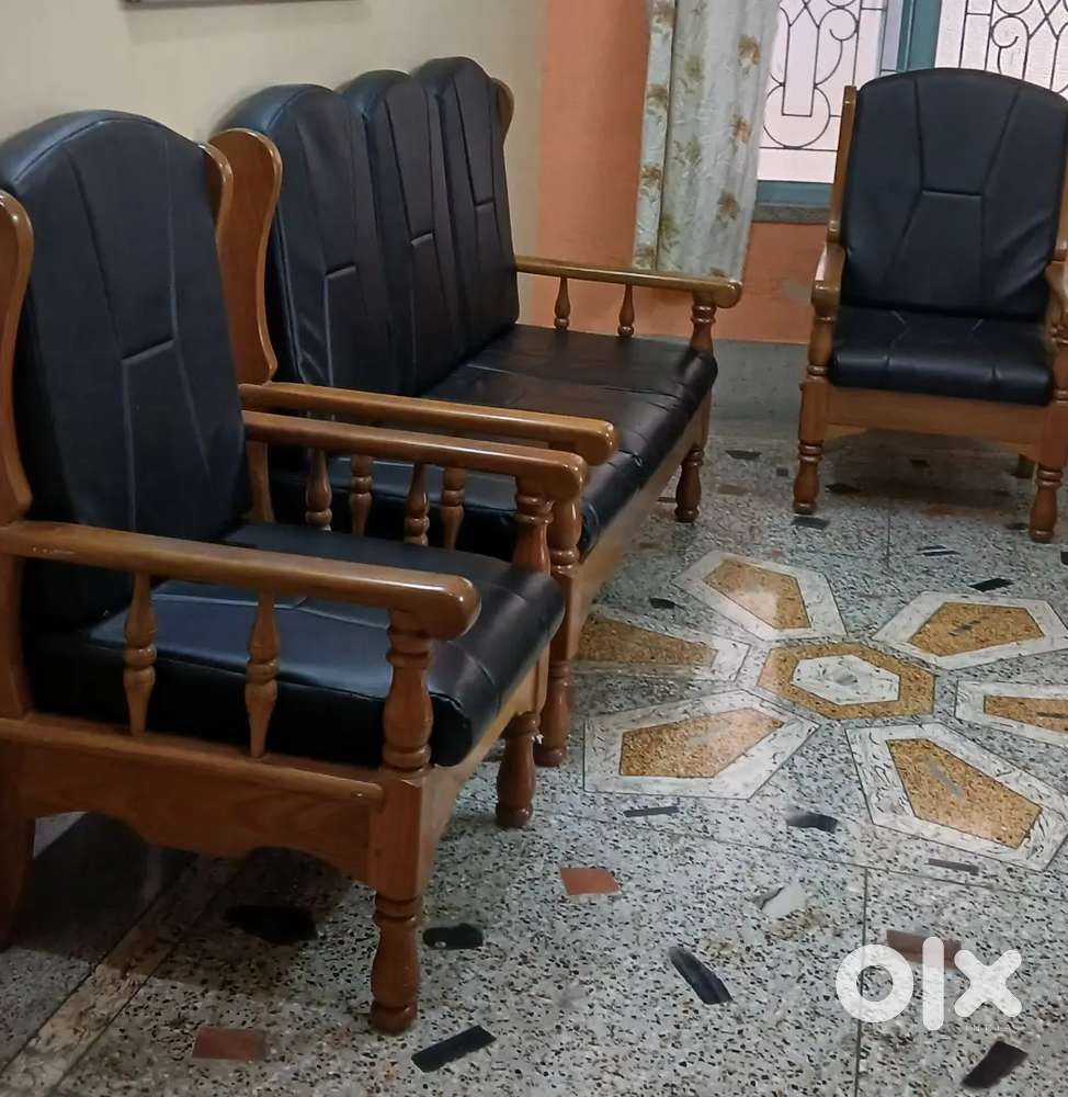 Wooden sofa in new condition