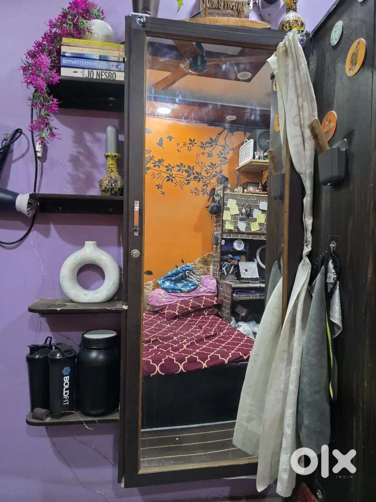 Dressing mirror with storage racks