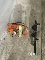 Earth auger machine