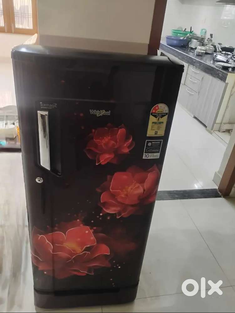 Whirlpool refrigerator 2.5yr old maroon flower pattern