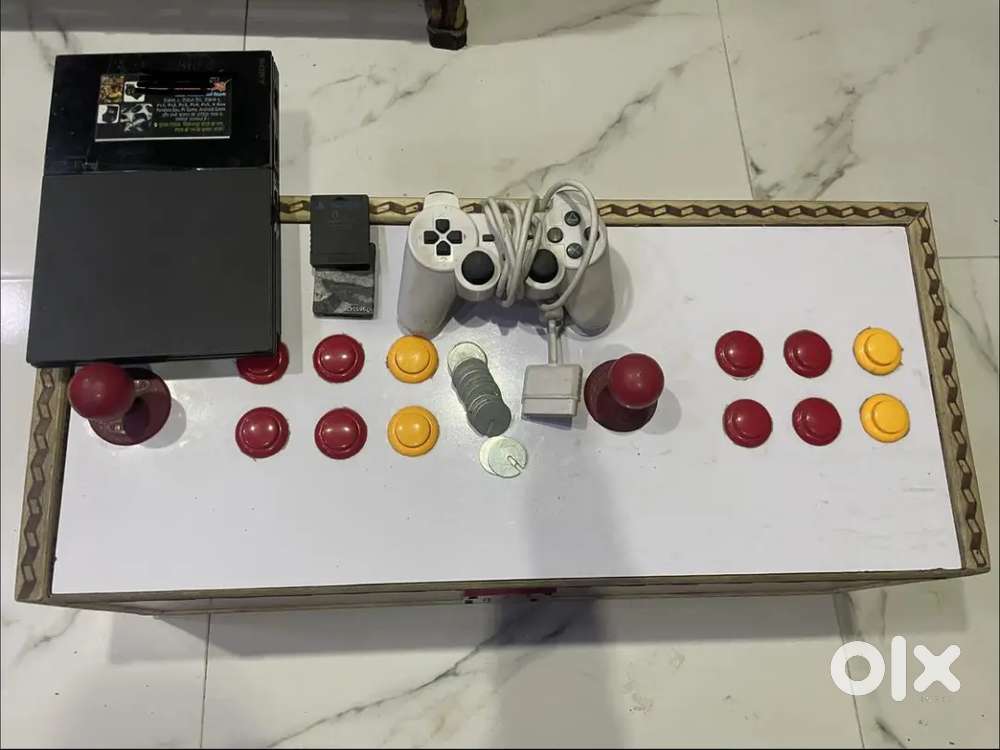 1 ps with 2  joystick and 100 coins with 2 memory card 1 controller