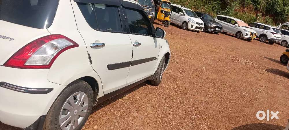 Maruti Suzuki Swift 2013 center locking leather seats 4  power windows