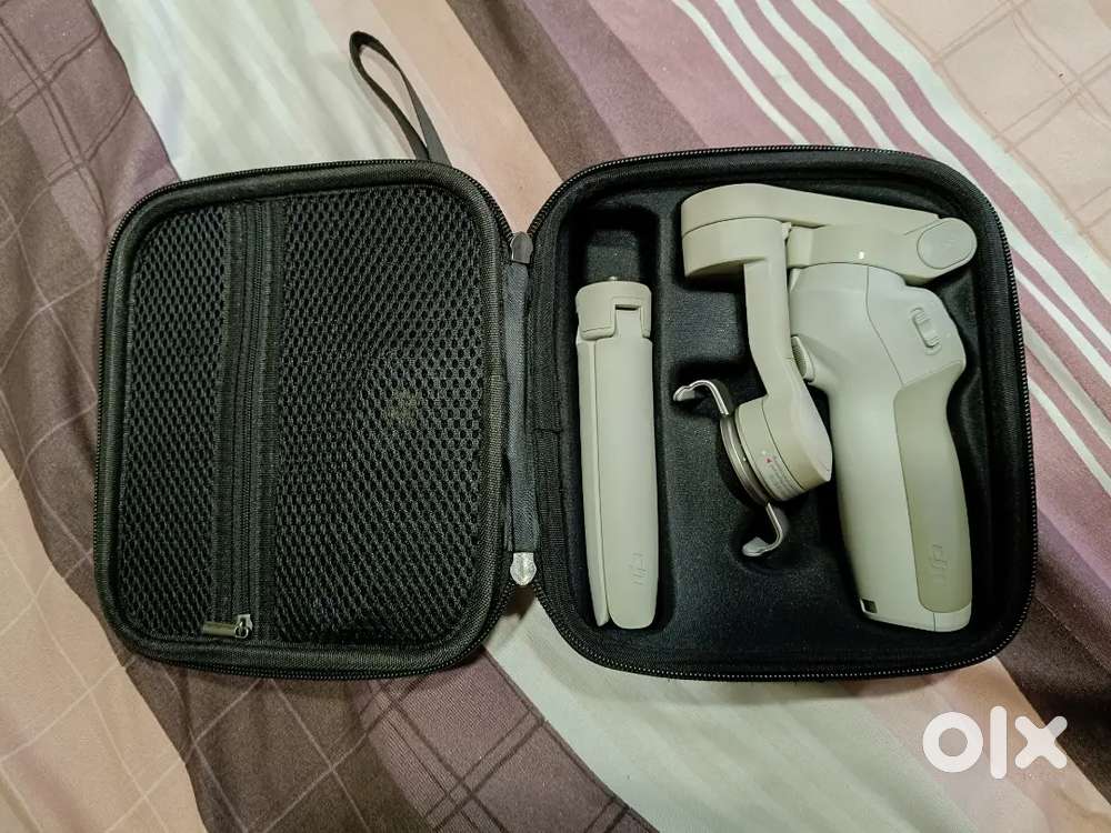 DJI Osmo Mobile 4 Gimbal – Like New, Rarely Used