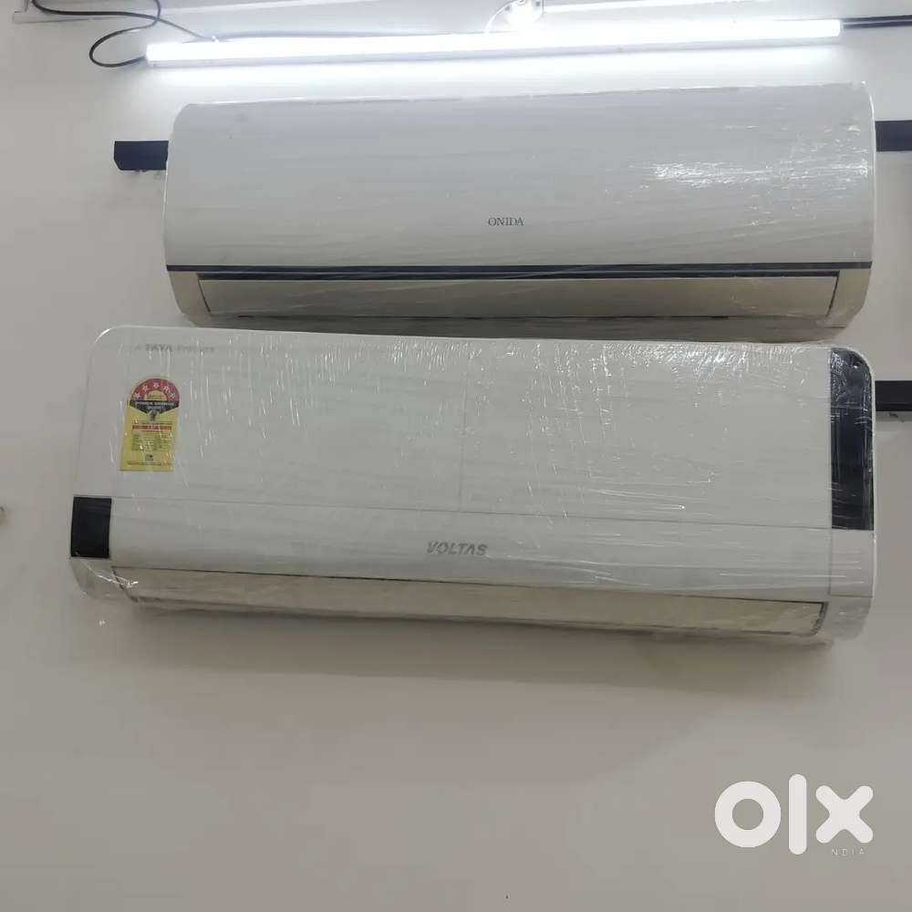 Voltas 1.5 ton split AC good condition with warranty 1 year old